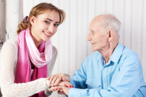 caretaker caring an elderly